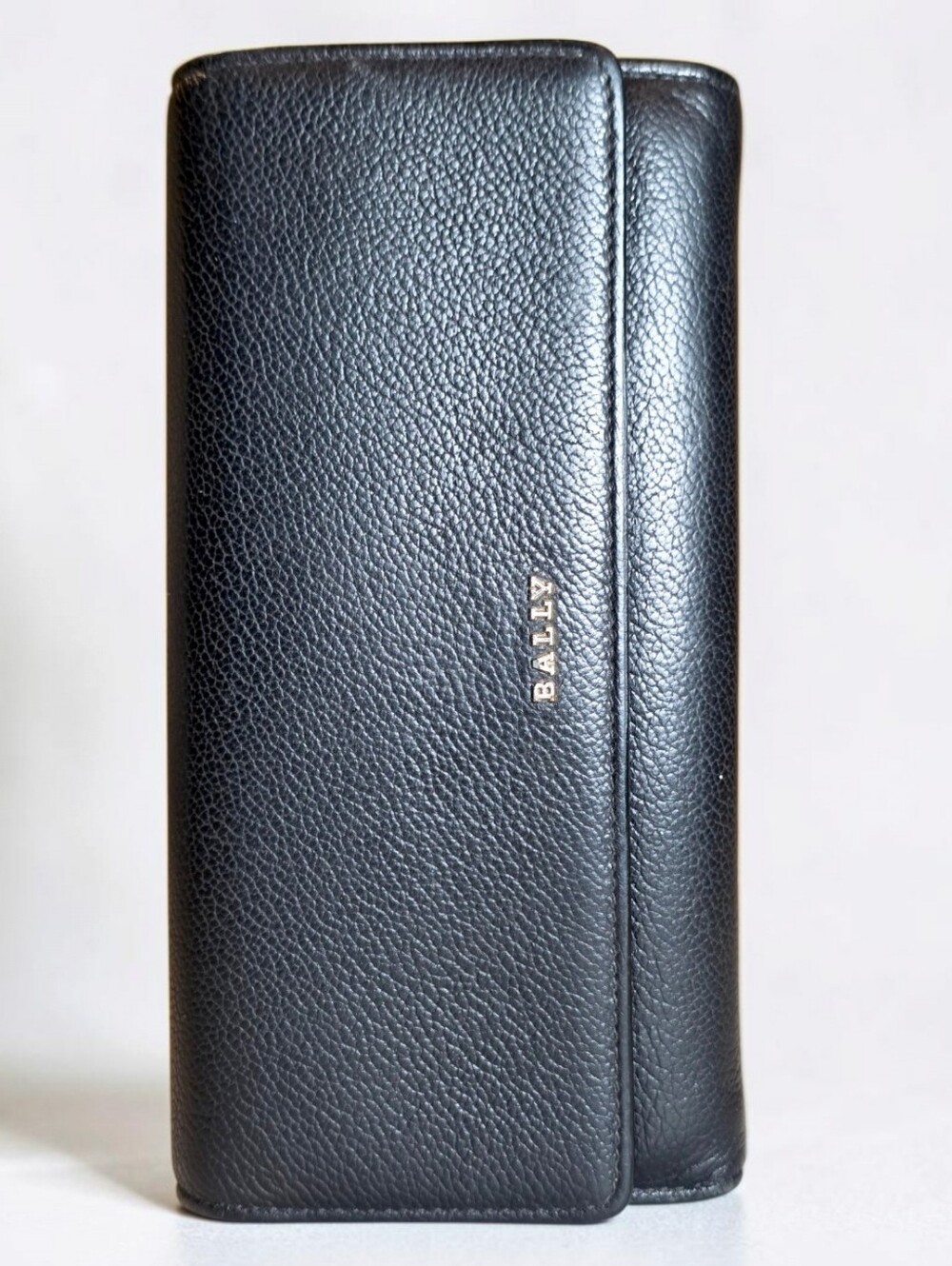 Bally Long Wallet Black Pebbled Leather with Gold Logo